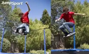 Teen performing skateboard-style tricks on a backyard trampoline using a bounce board, demonstrating an active outdoor trampoline game.