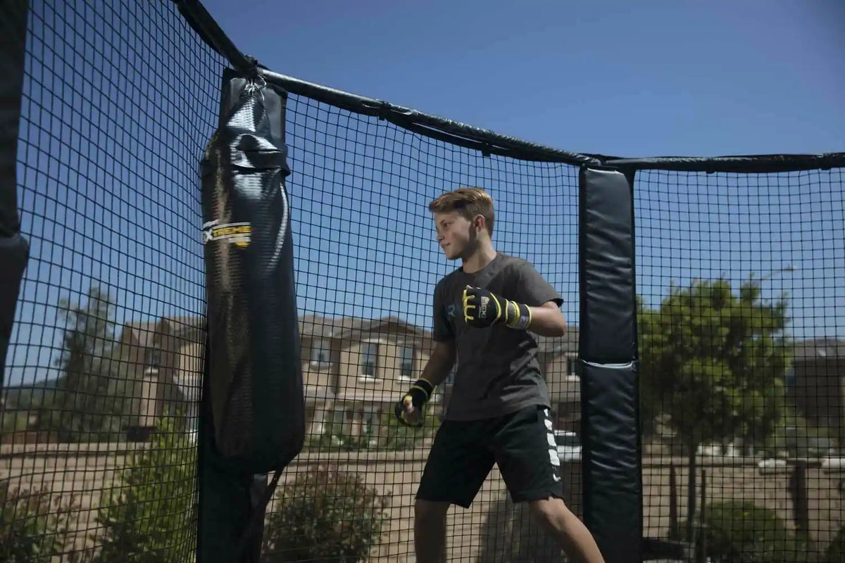 Child play boxing on AlleyOOP trampoline
