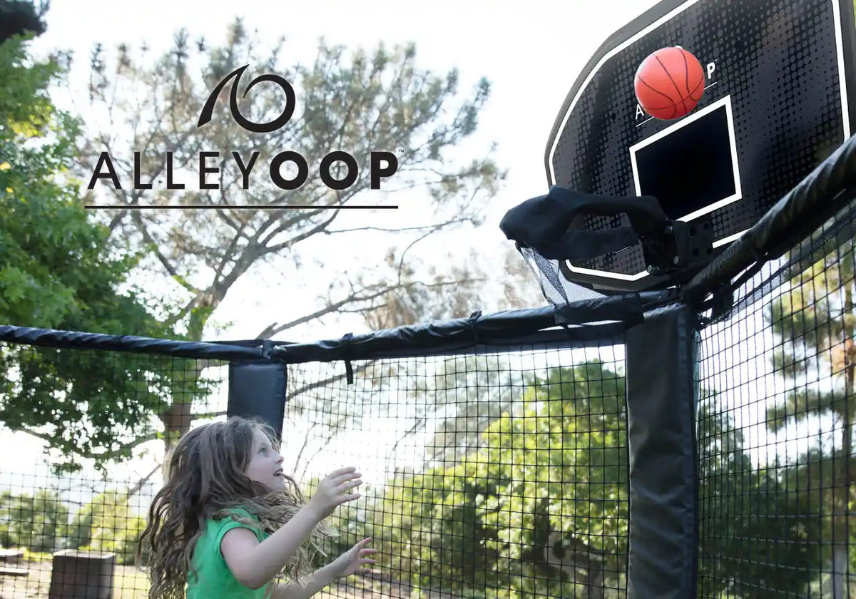 A girl playing with the AlleyOOP basketball on a trampoline. Buy the 7 inch orange trampoline basketball perfect for dunking! Spend hours of fun playing trampoline games or use with our AlleyOOP or JumpSport ProFlex.
