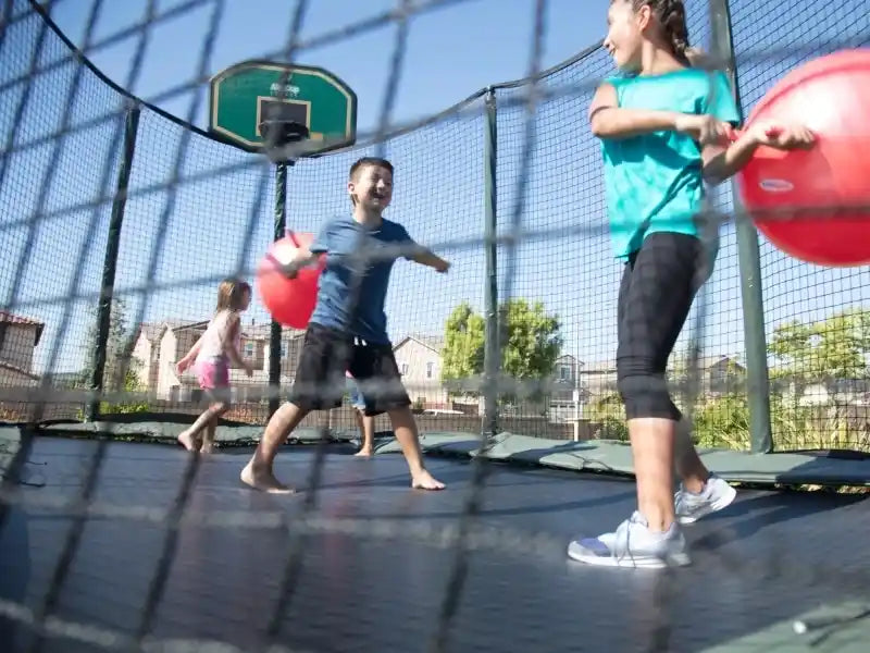 Kids playing on AlleyOOP trampoline