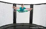 A girl jumping on a safely padded trampoline. These trampoline arena pads are a great addition for the budding extreme athlete. Extra padding for your JumpSport trampoline that makes it safer!