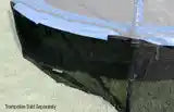 A safety skirt underneath an AlleyOOP trampoline. Keep your pets and kids out from underneath your trampoline with a JumpSport Trampoline Safety Skirt. 